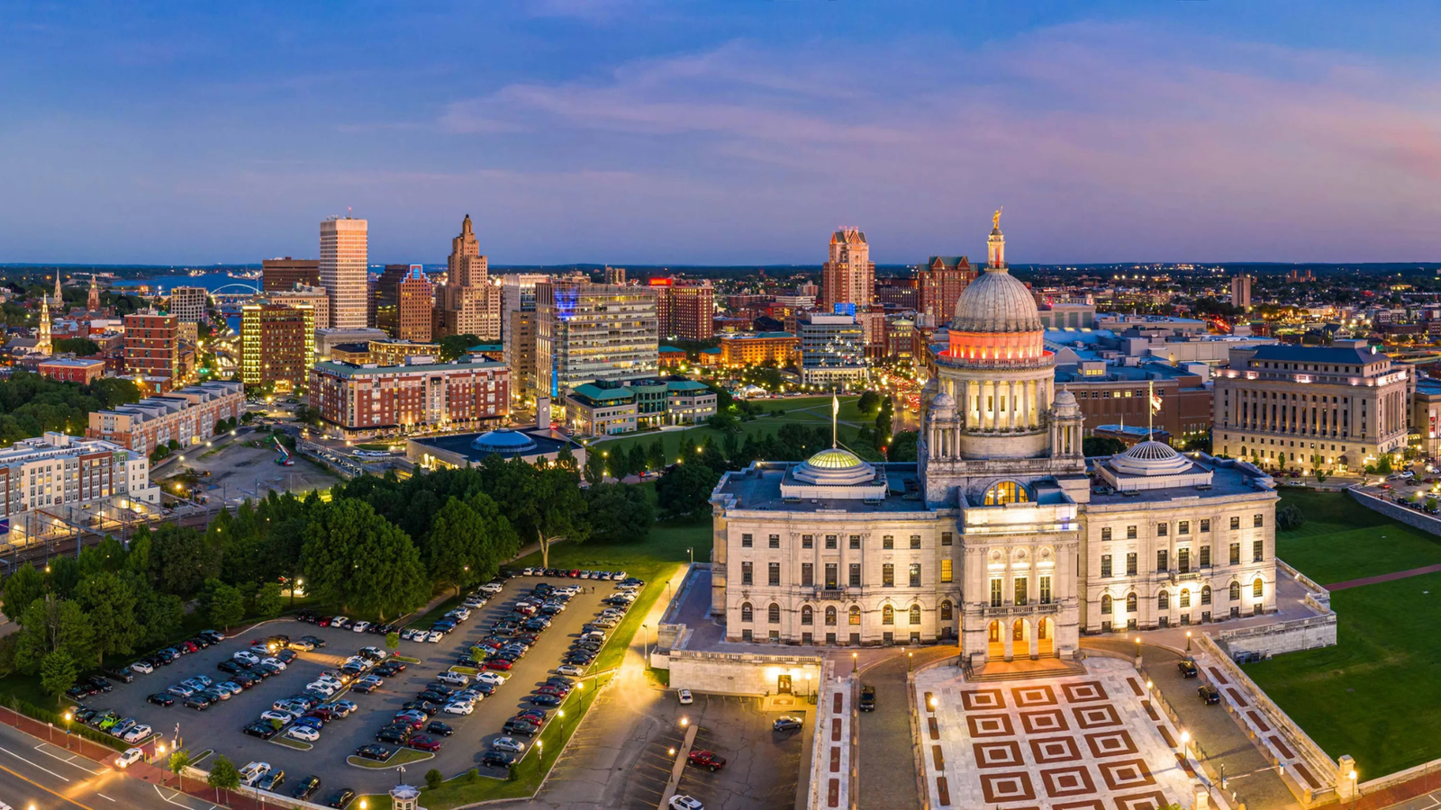 Rhode Island State House and Providence skyline at sunset representing the 2026 real estate market trends